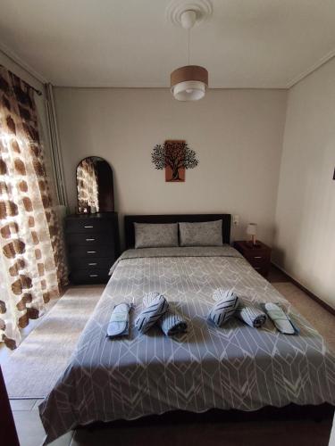 En eller flere senge i et værelse på The Cozy Haven