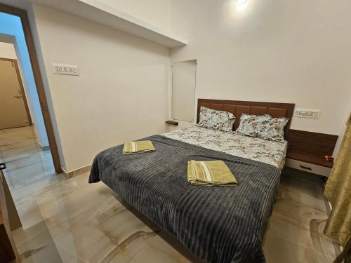 Postel nebo postele na pokoji v ubytování Rock Finch Holiday Homes - Malpe Beach