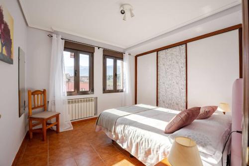 En eller flere senge i et værelse på Apartamento la Esperanza de Llanes