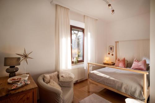 Postel nebo postele na pokoji v ubytování Villa Gartenblick