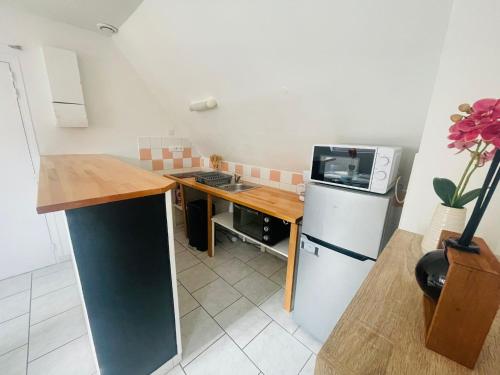 Appartement lumineux garage privé centre-ville