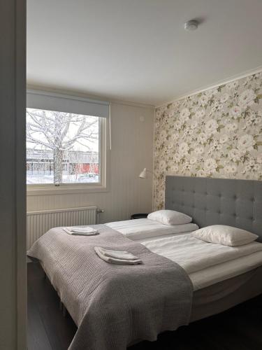 Postel nebo postele na pokoji v ubytování Motell Fyra Hästar