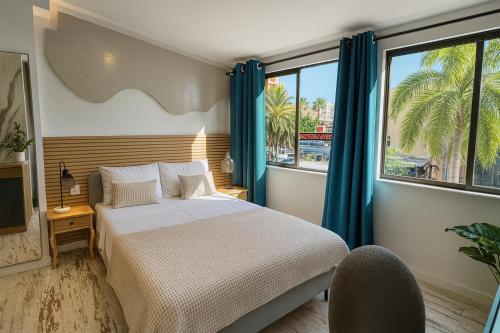 En eller flere senge i et værelse på Concept Rooms