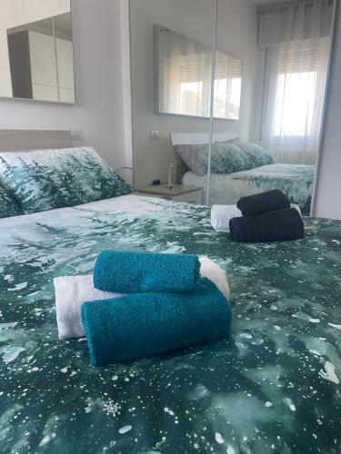 Een bed of bedden in een kamer bij Treviso Home Chic