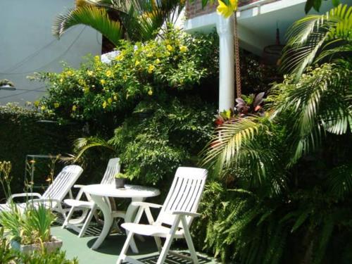 Κήπος έξω από το Chale Mineiro Hostel & Pousada