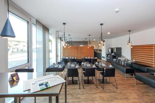 A restaurant or other place to eat at Design & Lifestyle Hotel Estilo