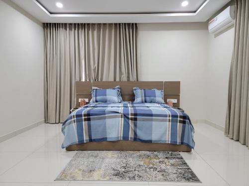 Кровать или кровати в номере High standing 4 bedroom apartment