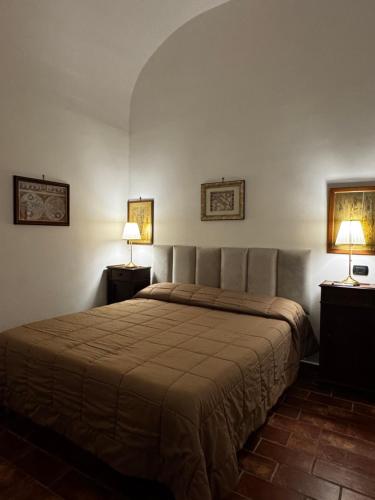 Una cama o camas en una habitación de B&B La Meta