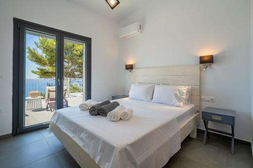 Кровать или кровати в номере Aphitriti Oxomeria