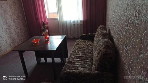 Posezení v ubytování Apartamentas