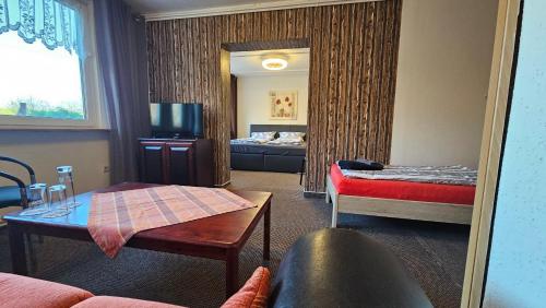 Giường trong phòng chung tại Pension Garni Zur Schamper Mühle