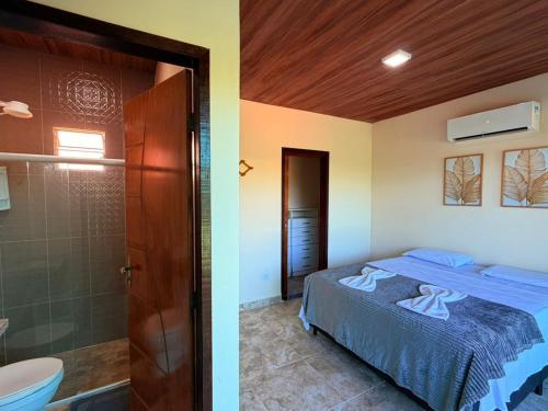 Et badeværelse på Casa de Temporada 3 Quartos - Coruripe AL