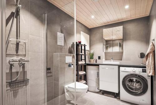 Et badeværelse på Exclusive cottage - Ski in ski out!