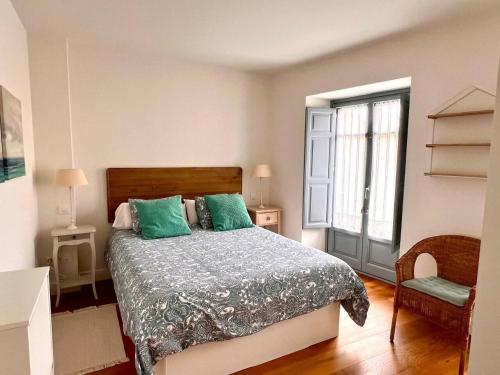 Ένα ή περισσότερα κρεβάτια σε δωμάτιο στο Apartamento Santa Ana