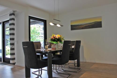 Khu vực ghế ngồi tại Ferienhaus Am Rarbach, 140qm