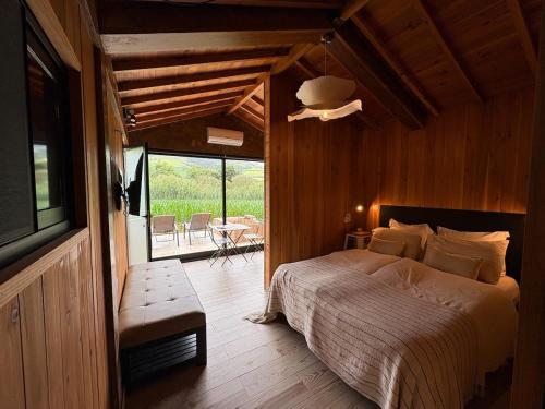 Ένα ή περισσότερα κρεβάτια σε δωμάτιο στο Villa Várzea - Barn Nest