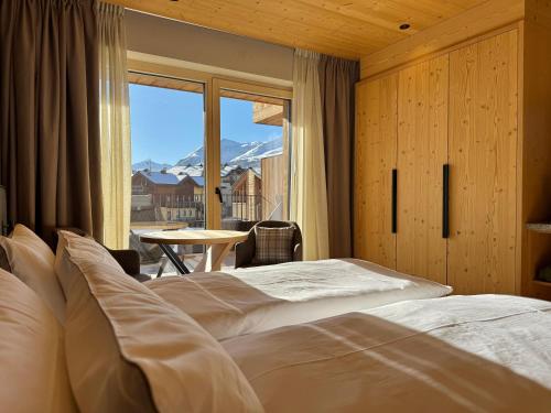 Postel nebo postele na pokoji v ubytování Hotel Damelis