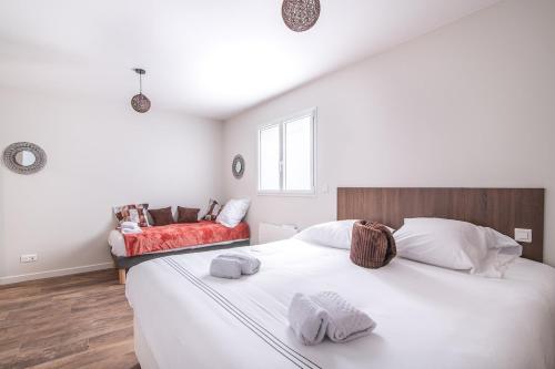 Postel nebo postele na pokoji v ubytování La Terrasse du Buchet