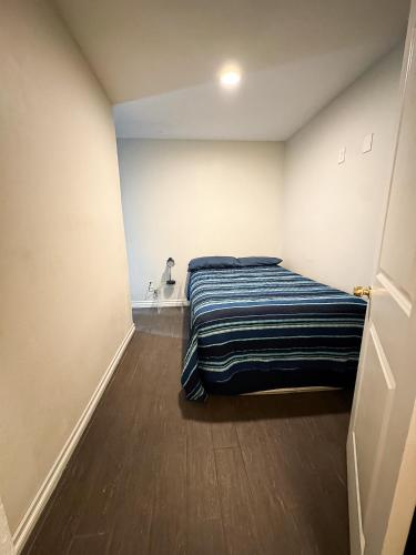 En eller flere senge i et værelse på Vernon Vibes