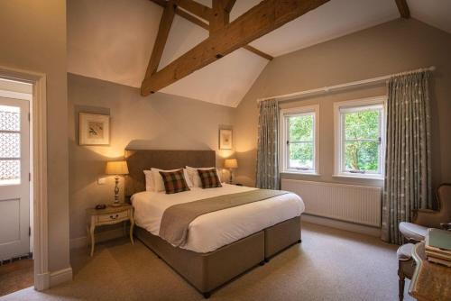 Ένα ή περισσότερα κρεβάτια σε δωμάτιο στο The Five Arrows Hotel