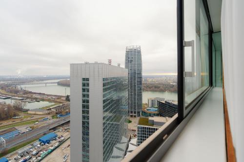 High Floor 2BR Downtown with Danube View Balcony Parking Available