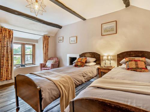 En eller flere senge i et værelse på 3 Bed in Clyro 88077