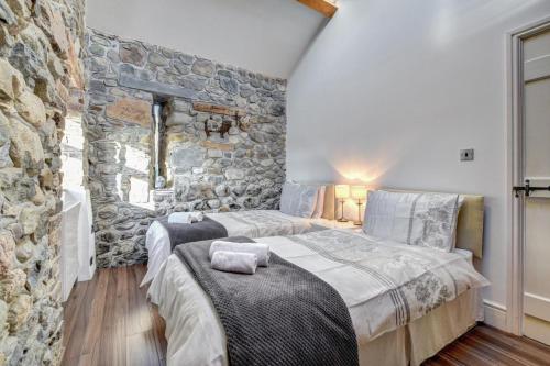 En eller flere senge i et værelse på 2 Bed in Caernarfon oc-76024