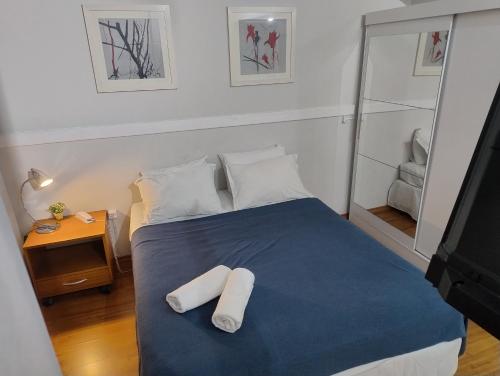 Postel nebo postele na pokoji v ubytování Hotel Slaviero Moema GrandFlats Suíte Master Luxo II