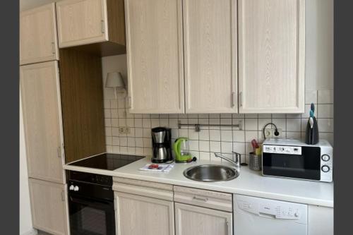 Køkken eller tekøkken på BoLA Ferienwohnung Hamburg Nr 21 EG für 2 Personen, Parkplatz