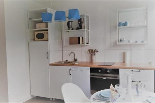 Køkken eller tekøkken på BoLA Ferienwohnung Hamburg 54 für bis zu 2 Personen