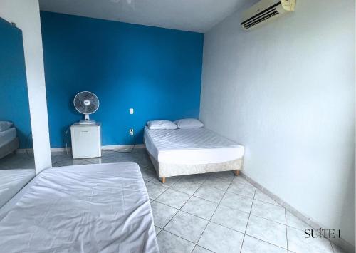 Postel nebo postele na pokoji v ubytování Casa FRENTE MAR Anchieta c/piscina e Área Goumert