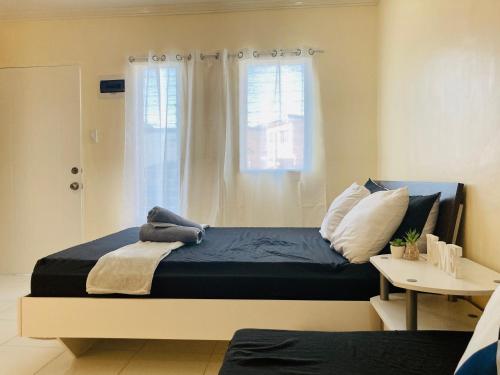 Postel nebo postele na pokoji v ubytování Asahel Cozy Crib Budget studio with Netflix