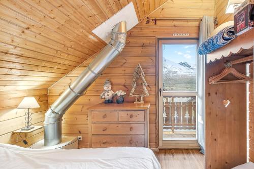 En eller flere senge i et værelse på Chalet la montagne numero 10