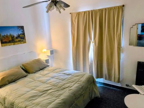 En eller flere senge i et værelse på Valle Encantado