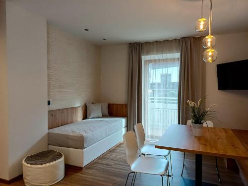 En eller flere senge i et værelse på Haus Schönblick