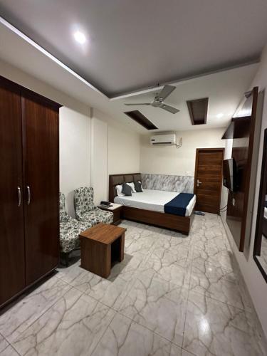 Ένα ή περισσότερα κρεβάτια σε δωμάτιο στο Hotel Moon Stone