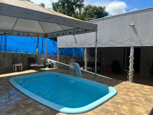 Swimmingpoolen hos eller tæt på Chácara Recanto da Paz