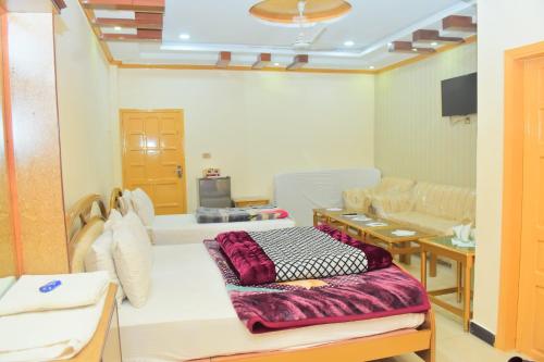 TV a/nebo společenská místnost v ubytování Hotel Ambassador