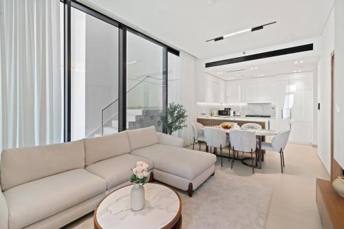 2BR apartment with a Private Pool in JVC by Stay in Homes - Elegant & Fully furnished - Gym - Parking