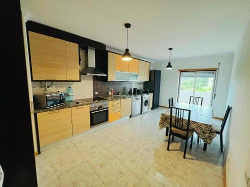 Kuchyň nebo kuchyňský kout v ubytování Moinho do vento