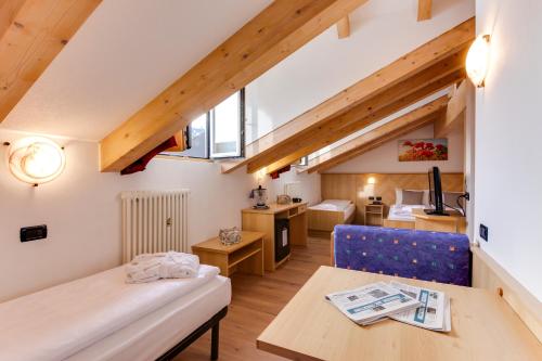 Postel nebo postele na pokoji v ubytování Phi Hotel Bellamonte