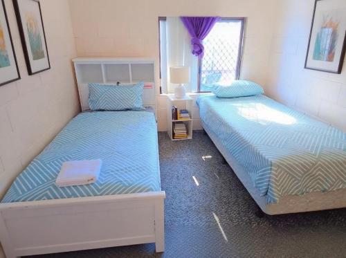 En eller flere senge i et værelse på Unit 4 - Kalgoorlie, Golden Patch Retreat