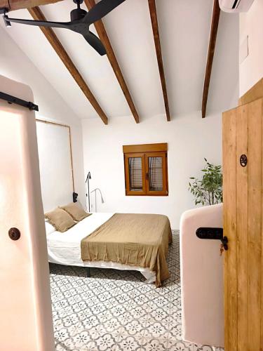 En eller flere senge i et værelse på Casa Abadía Boutique Stay