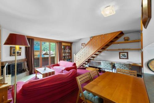 Ένα ή περισσότερα κρεβάτια σε δωμάτιο στο Wohnung in Gstaad