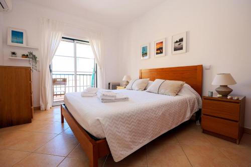 Postel nebo postele na pokoji v ubytování B95 - Casa Melo Apartment in Praia da Luz