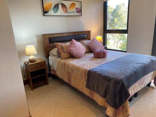 En eller flere senge i et værelse på Departamento con acceso directo a una playa exclusiva