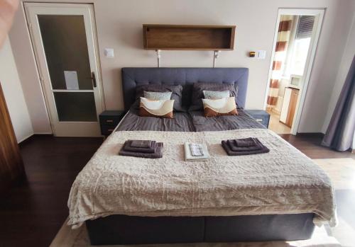 Postel nebo postele na pokoji v ubytování Katica Apartman