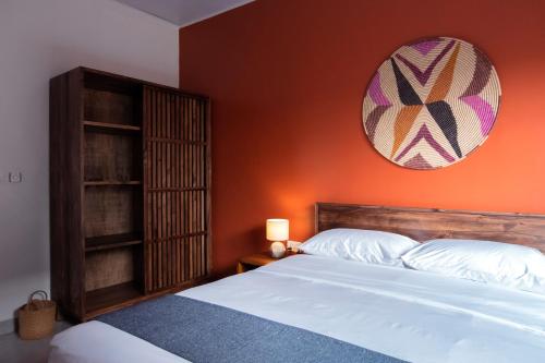 Llit o llits en una habitació de Kona Cottages