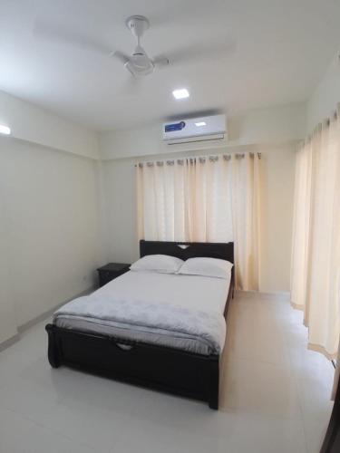 Giường trong phòng chung tại Chiakunja