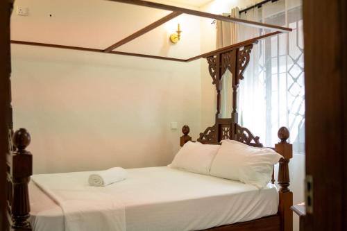 Ένα ή περισσότερα κρεβάτια σε δωμάτιο στο Serena10